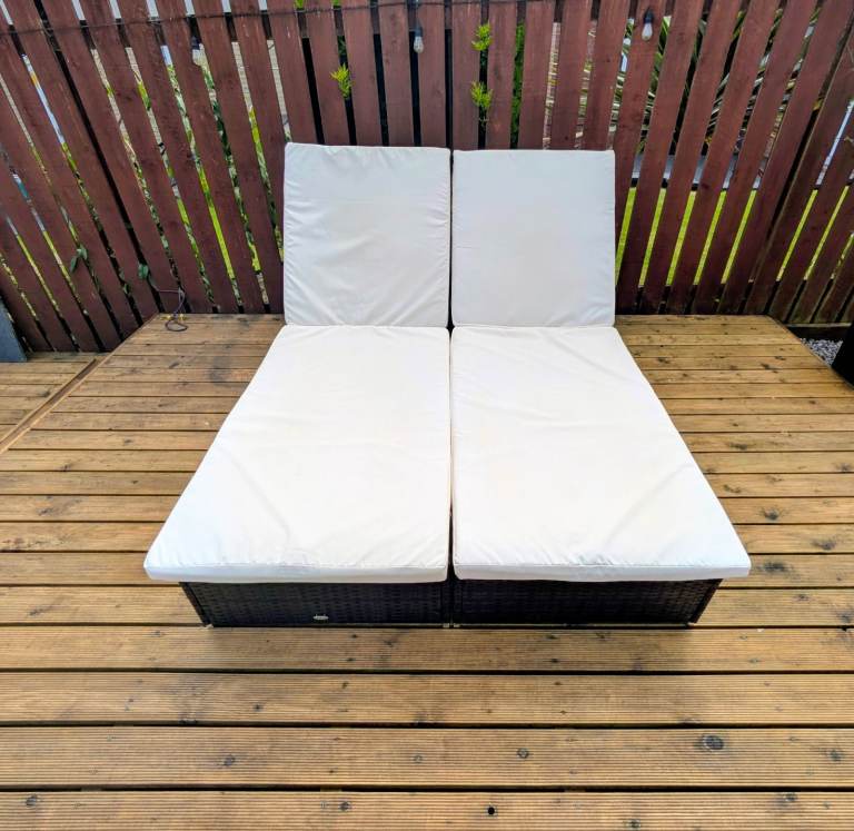 2 Brown Rattan Sun Loungers, comfy cream cushion, waterproof covers