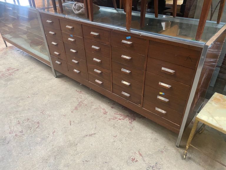 X 2 MIDCENTURY 25 DRAWER HABERDASHERY COUNTERS ,OVERALL CONDITION IS GOOD ,FREE LOCAL DELIVERY