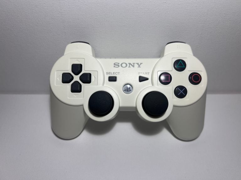 Genuine white PlayStation 3 duelshock controller