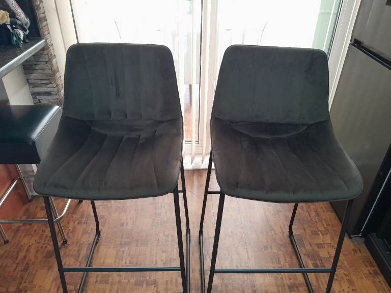 2 grey bar stools