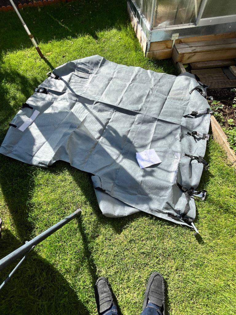 pale grey caravan towing cover