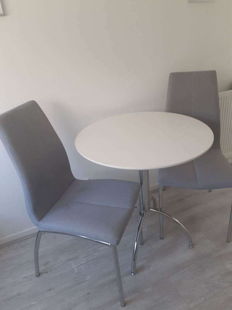 White Round Dining Table with 2 Grey Chairs – Good Condition