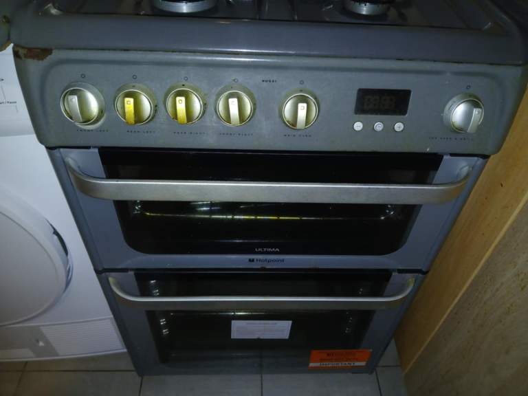 Hotpoint HUG61X 60cm grey gas oven freestanding cooker