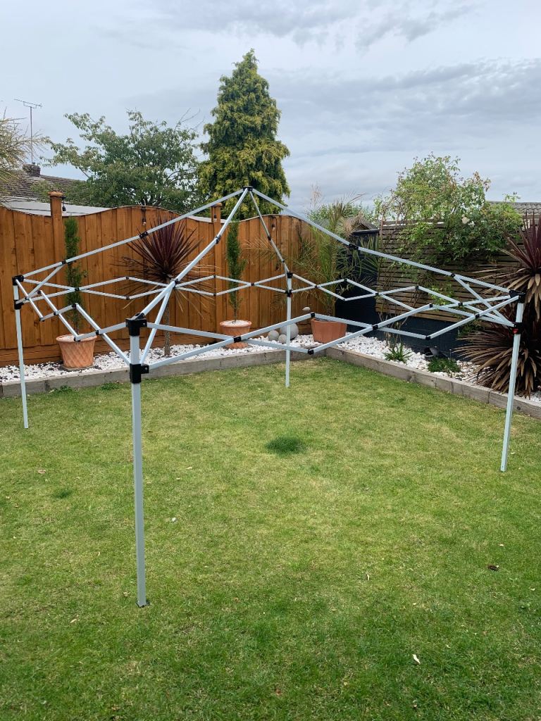 Pop Up Gazebo Frame with bags Ropes, and Pegs