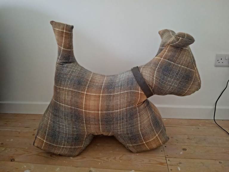 **  unusual large checked dog foot rest**