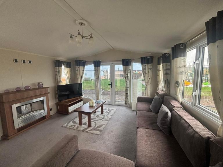 SOLD! Static caravan for sale sited and connected by the beach £5K DEPOSIT
