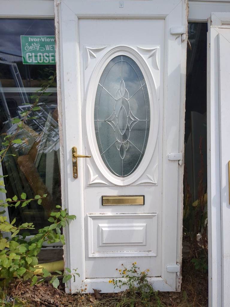 White UPVC External Door with Oval Glass Panel
