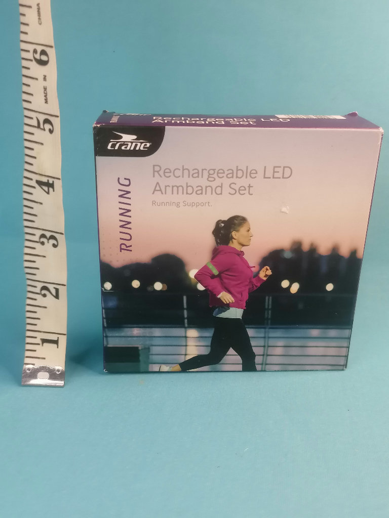 Brand new Retractable Armband set. 