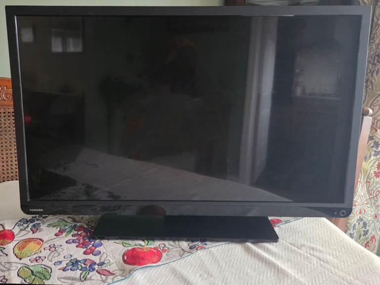 Toshiba 32-inch TV featuring a built-in DVD player