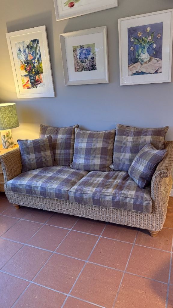 Wicker Sofa with Plaid Cushions – Good Condition