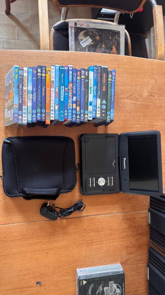 Naviskauto Portable DVD Player with Loads of Childrens DVDs