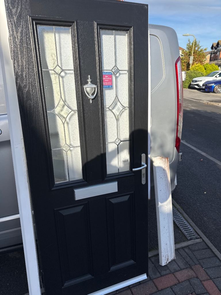 Good condition composite door in black 