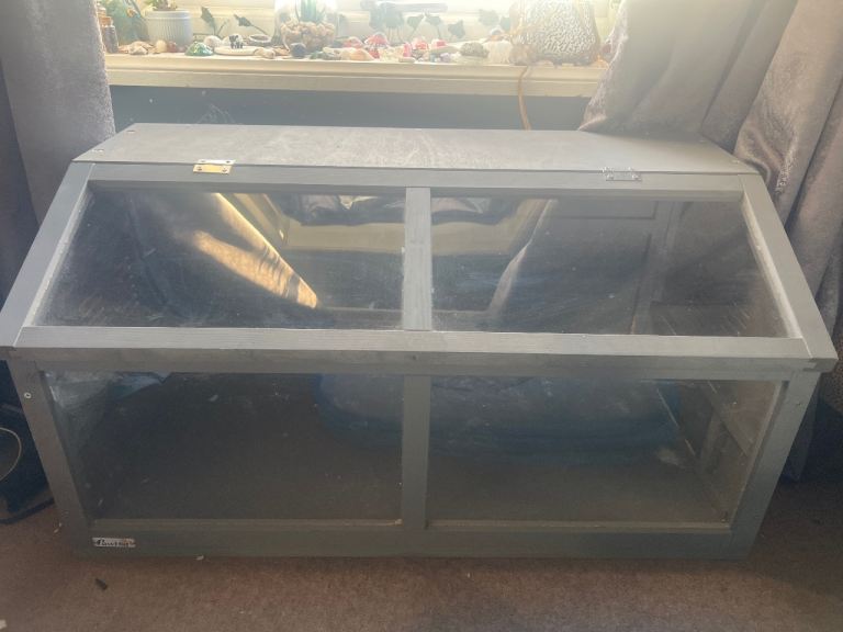 grey wooden hamster cage and accessories