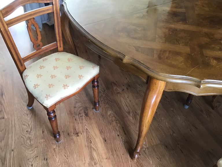 Dining table with 6 chairs plus two inserts for table to make it bigger 