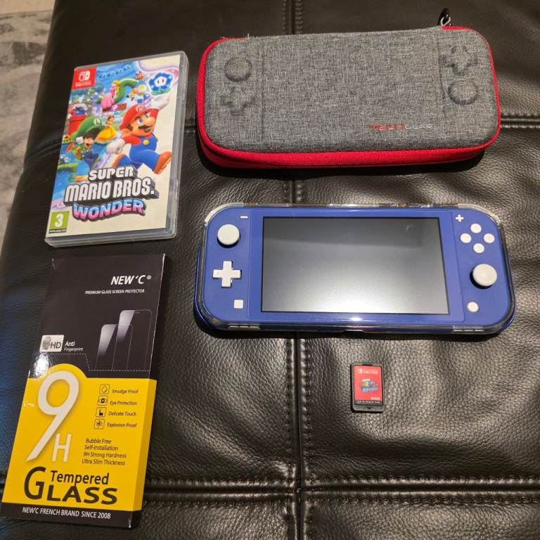 Nintendo Switch Lite Blue with Extras