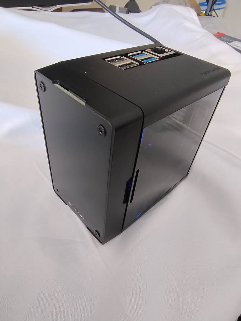 Raspberry Pi 5, 8Gb, inside and Electrocookie Mini Tower Case. With 256 GB M2 SSD