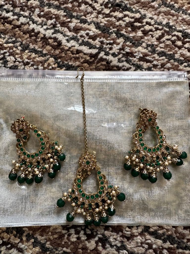 Green earrings and tikka 