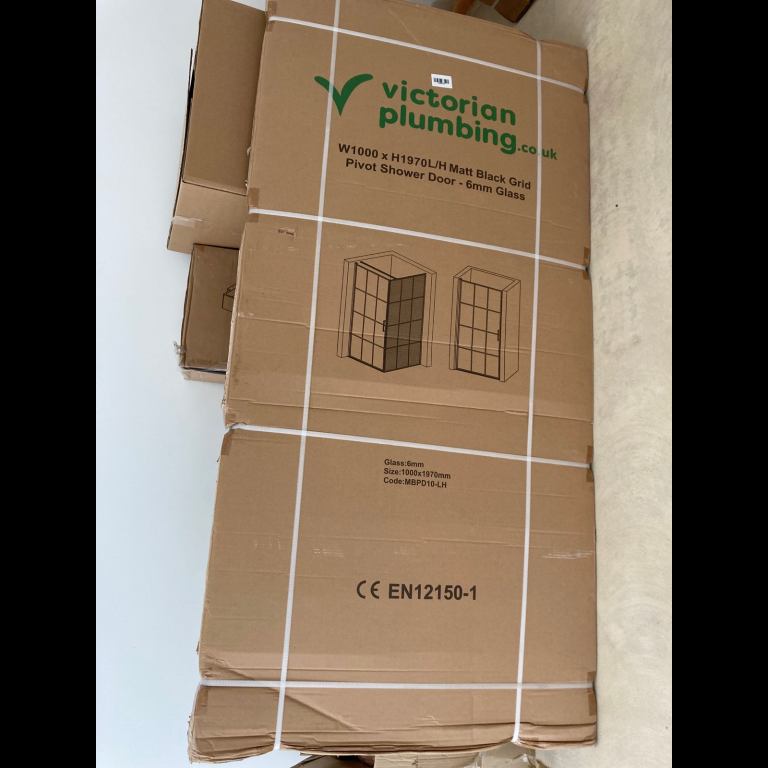 Crittal-style Victorian Plumbing Arezzo Black grid pivot shower door - industrial/ Crittal style