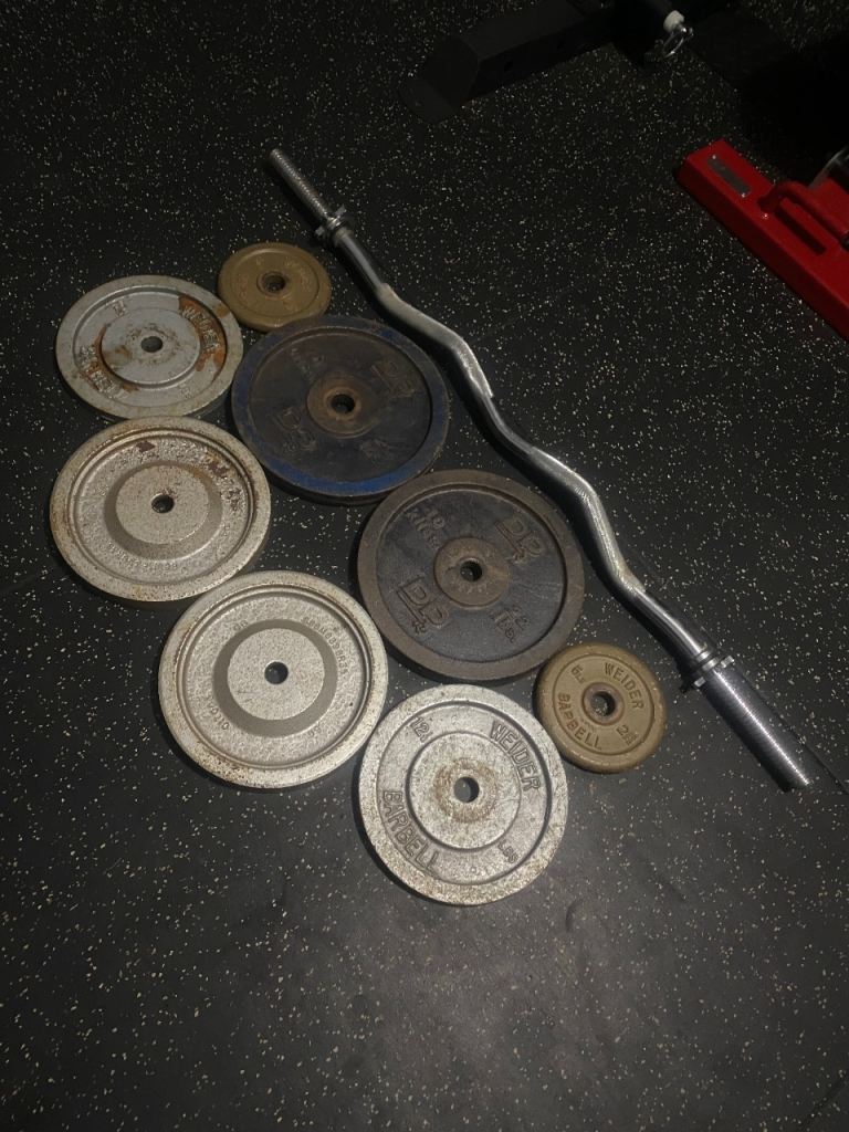 image for Solid spinlock ez curl bar with 55kg cast iron weights 4x 10kg, 2x 5kg & 2x 2.5kg