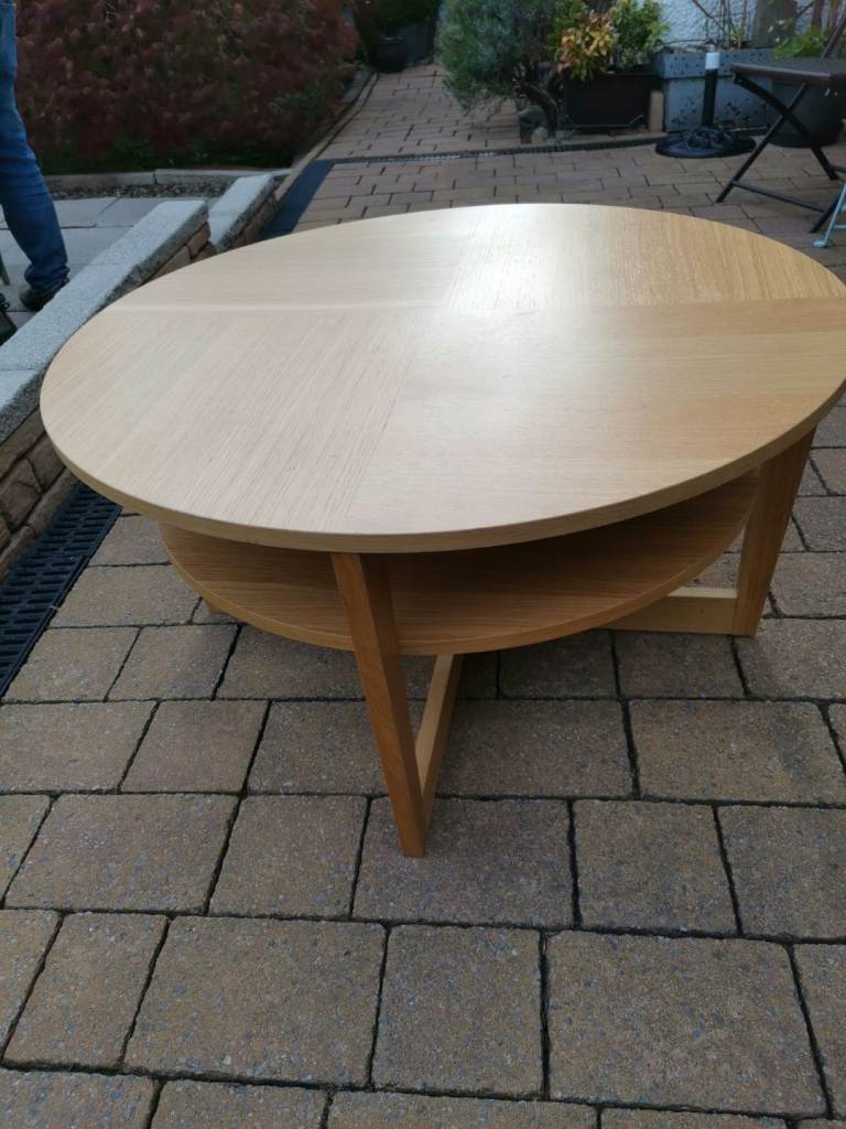 Ikea Vejmon classic style round coffee table with lower shelf. Oak veneer.
