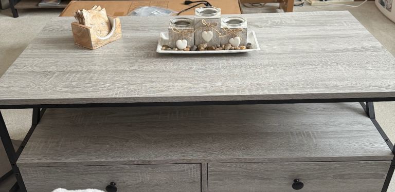 Solid grey coffee table very new in excellent condition 