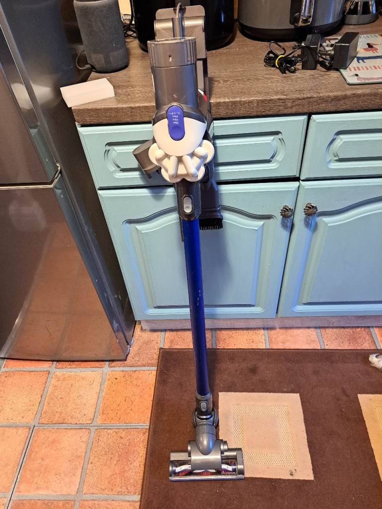 refurbished working dyson DC44 cordless handheld dock station tol new charger new battery