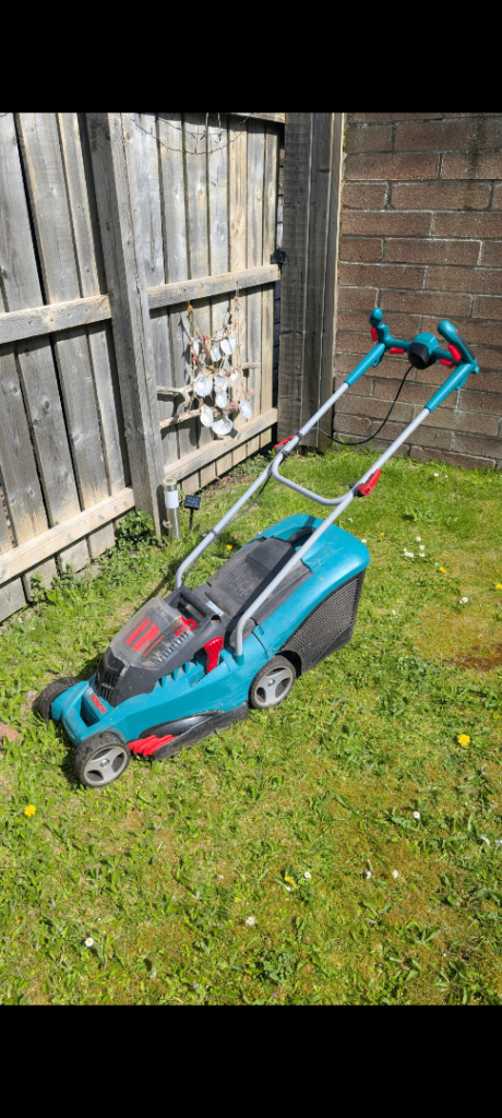 Bosch Rotak 34Li cordless lawnmower and two Bosch batteries