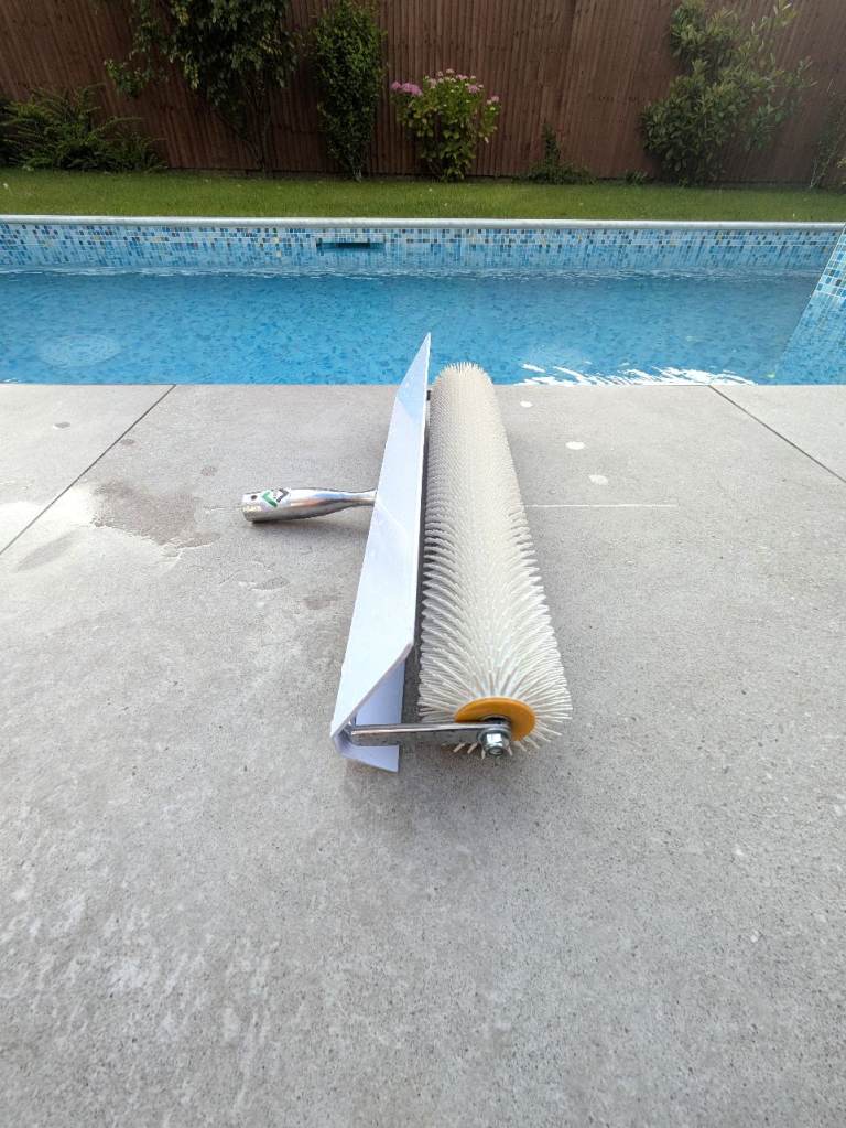 Leveling Compound and Aeration Spikked Roller