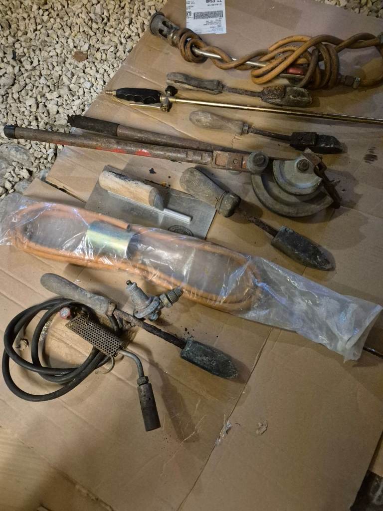 A selection of plumbing tools. 