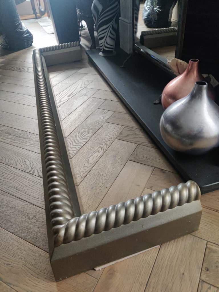Fireplace fender, with distinctive barley sugar twist finish