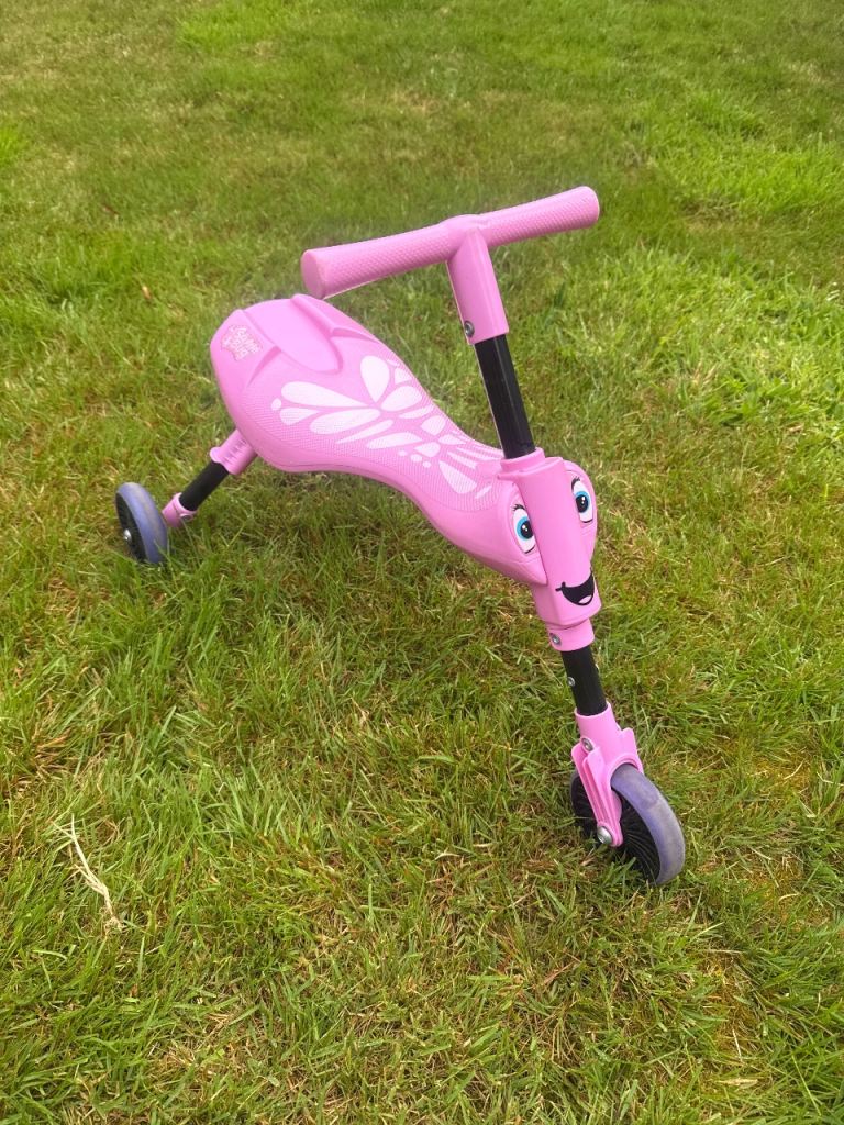 Children’s pink Scuttlebug scooter
