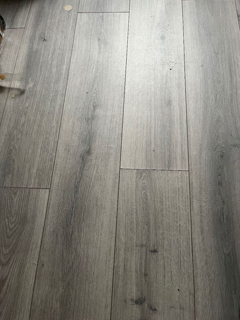 Grey Wood Effect Laminate Flooring - Excellent Condition