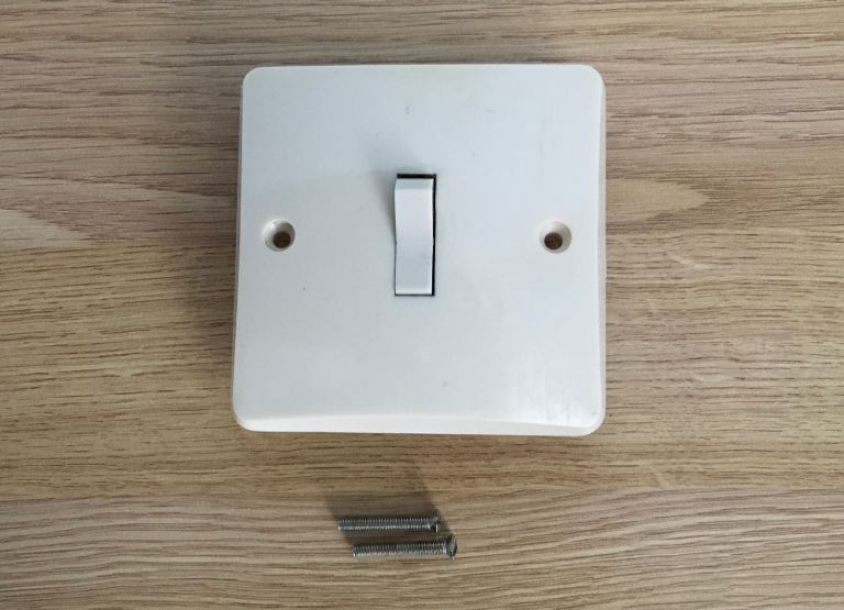 Five vintage cream plastic light switch plates