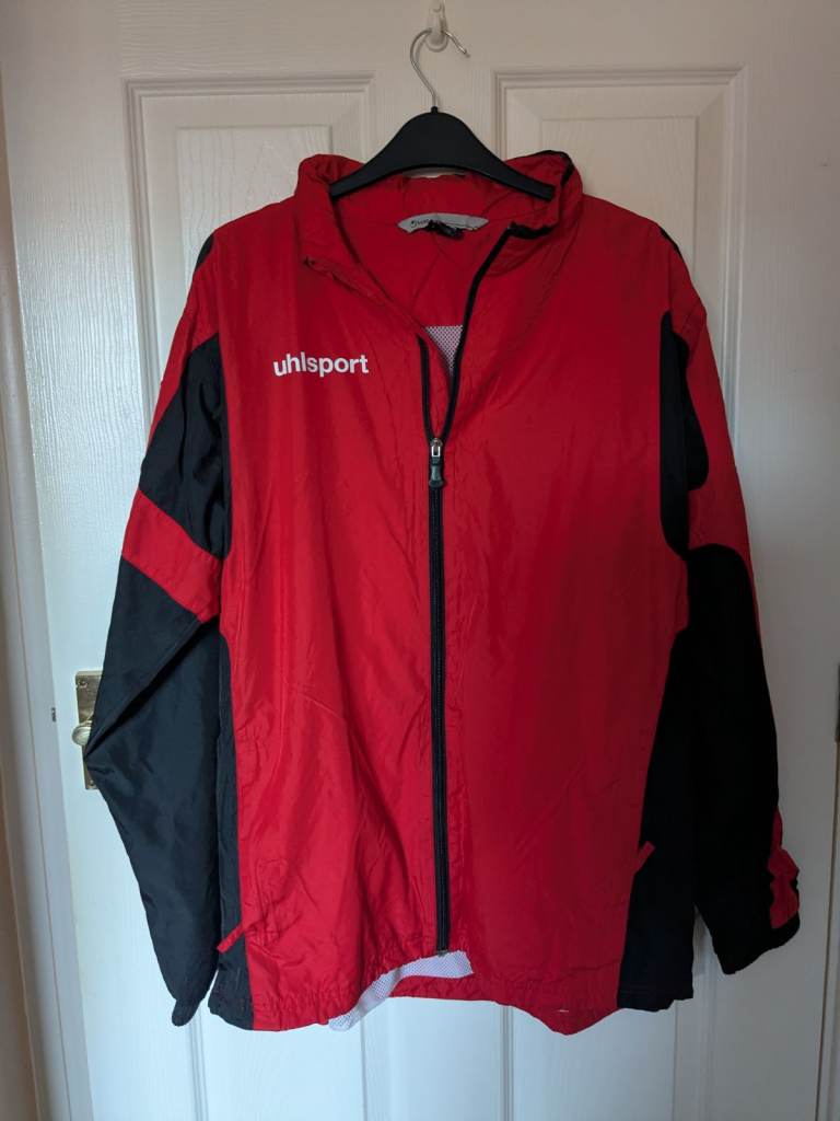 Red and black lightweight windbreaker jacket with hood