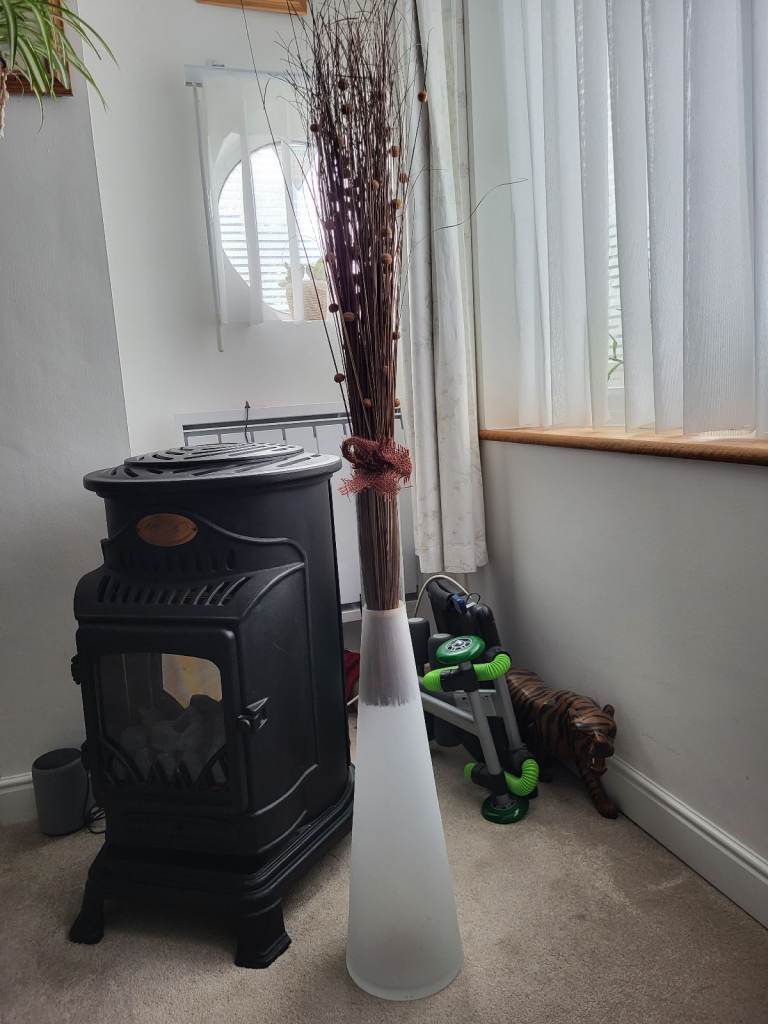 IKEA VERY TALL GLASS VASE WITH DRIED GRASSES ARRANGEMENT.