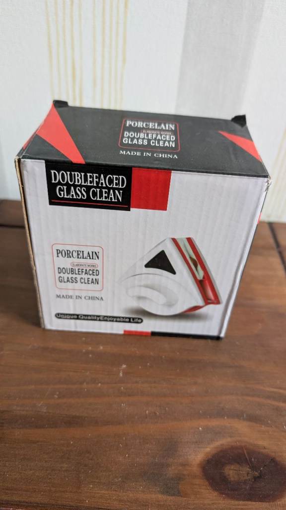 Magnetic double faced window cleaner