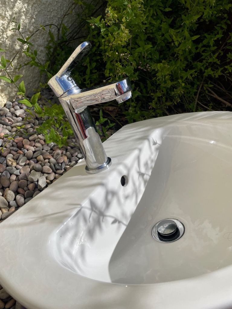 Bathroom sink and tap