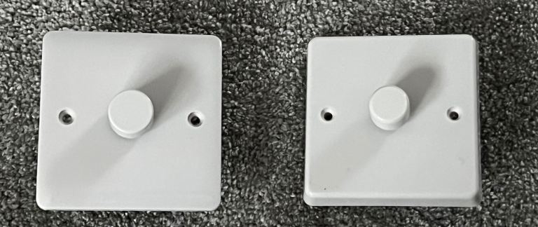 2 white gloss dimmer switches.
