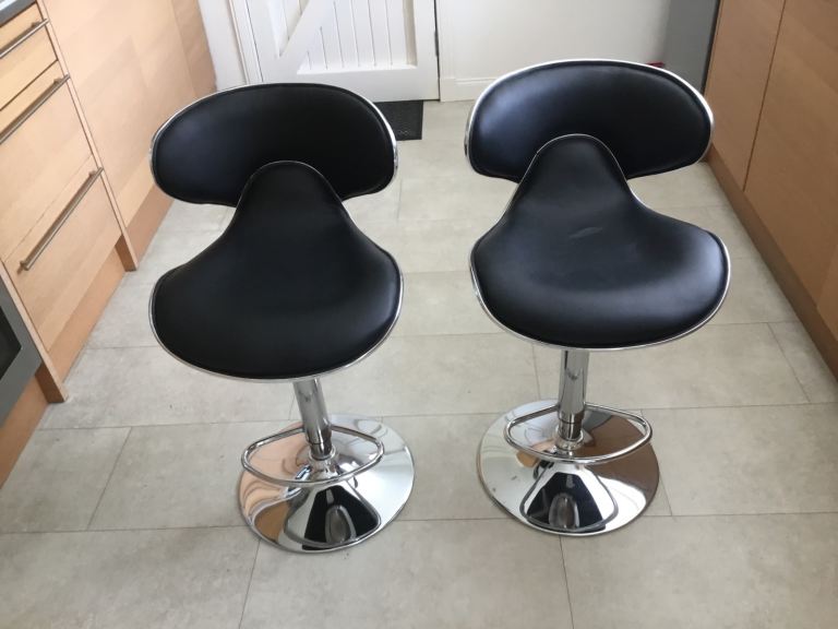 Black faux leather bar stools