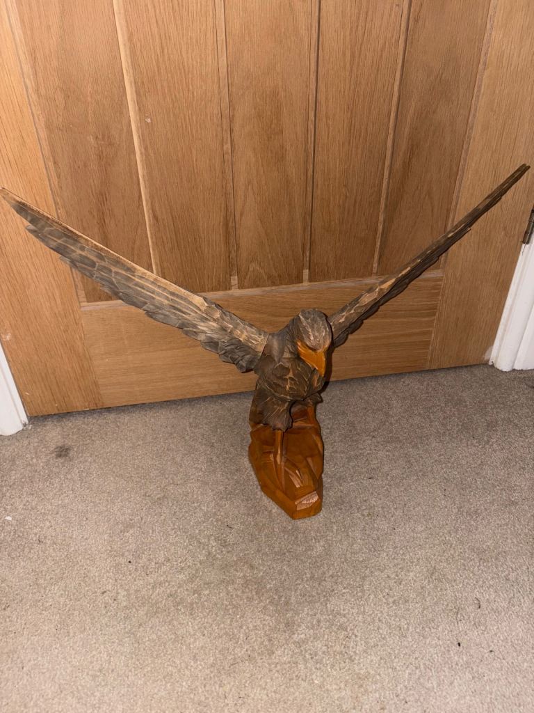 Wooden golden eagle carving