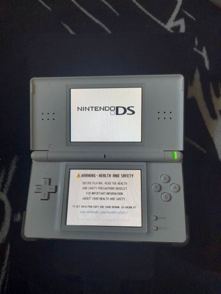 Nintendo ds lite white with charger and case