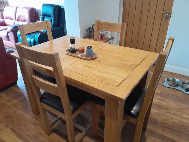 Solid Oak extending table and 6 chairs