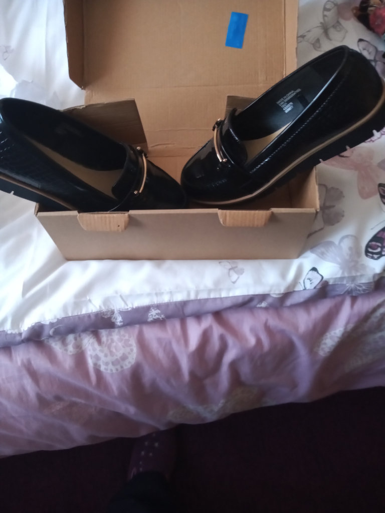 Brand new black and brown trim shoes ,