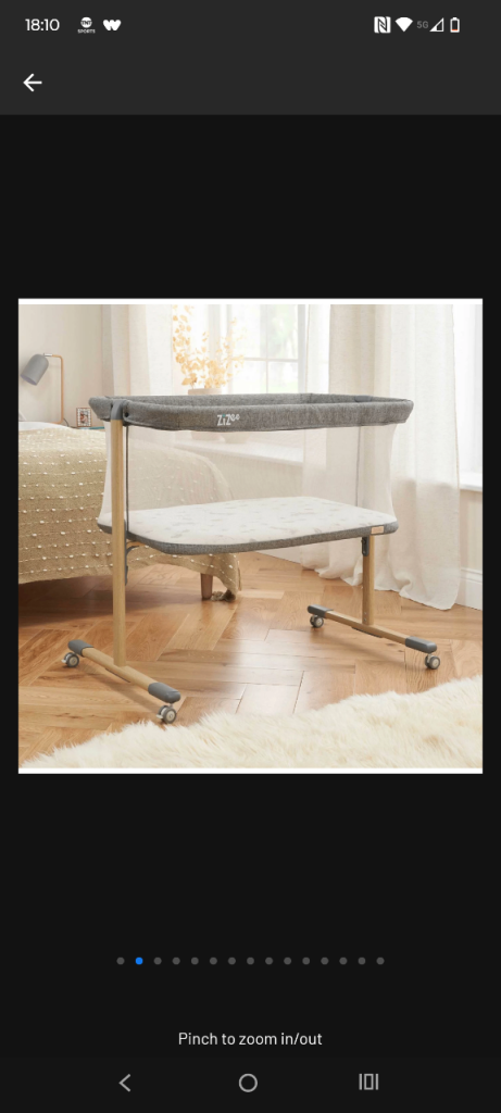 Grey crib with stand 