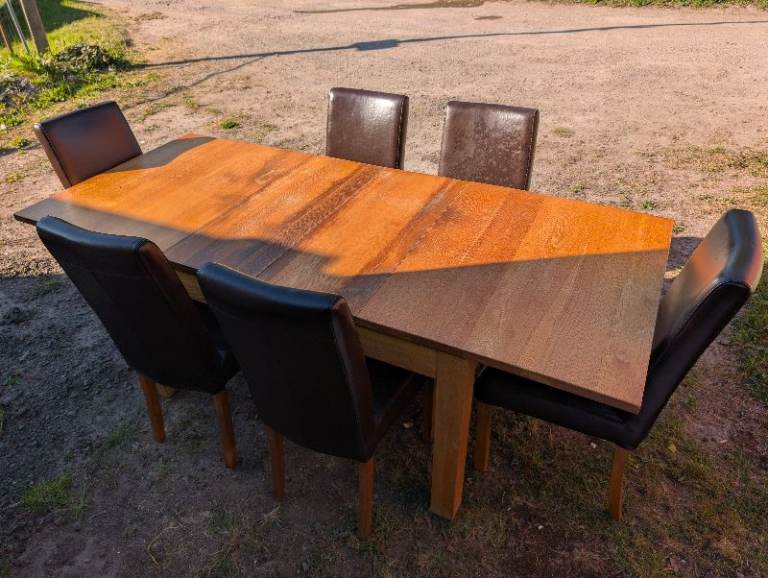 Solid wood dining table and 6 chairs