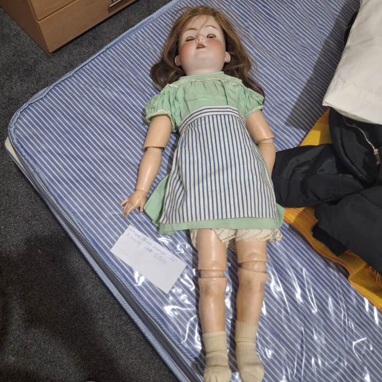 Antique Porcelain Head Doll in Green & Striped Dress