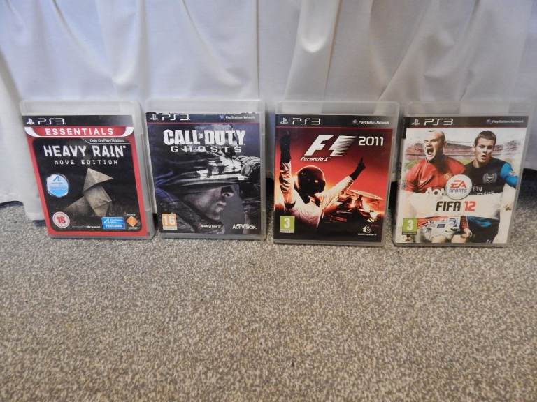 PS3 games bundle: 4 Games: Heavy Rain, F1, Call of Duty: Ghosts, FIFA 12.
