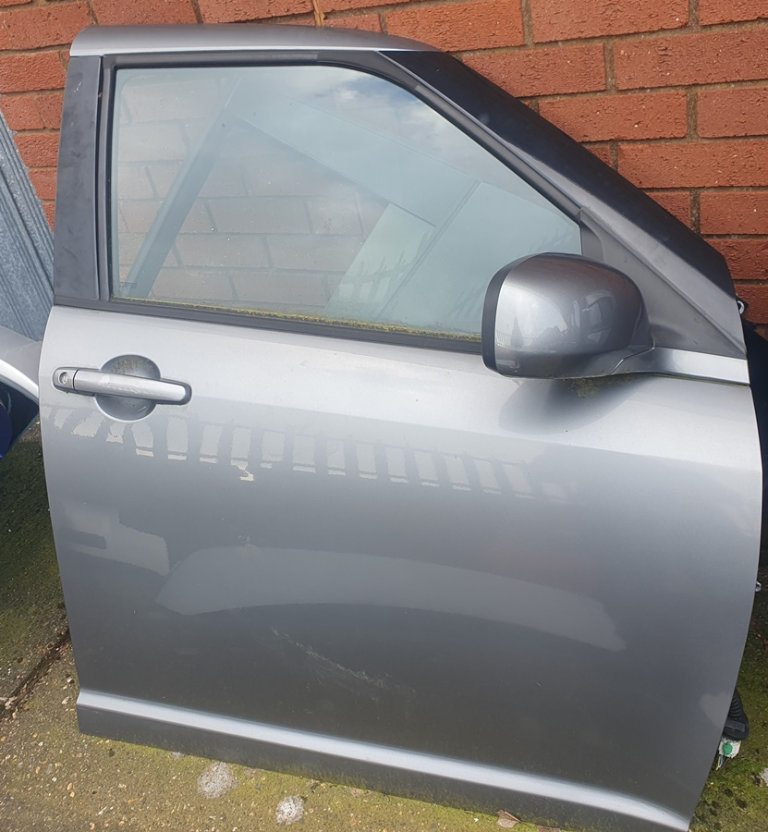 Suzuki Swift Driver Side Door Grey 2009