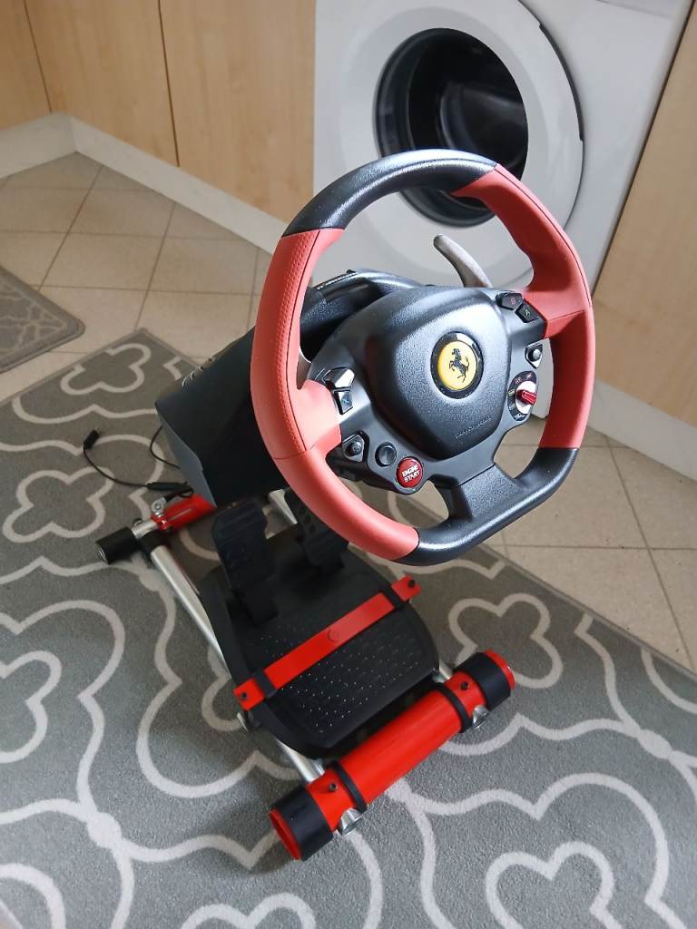 Gaming sterring wheel & pedals on metal frame