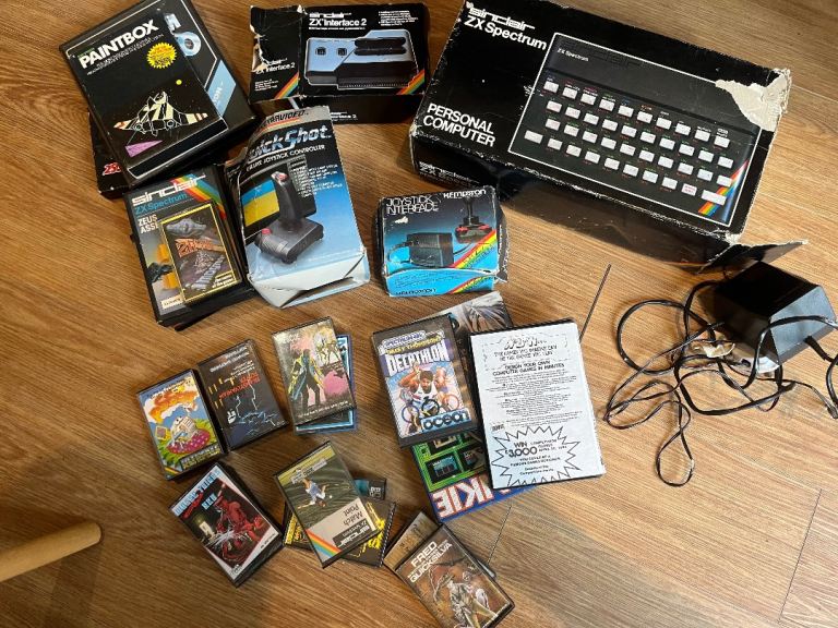 Sinclair zx spectrum vintage console with games joystick etc